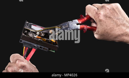 Hard disk drive and pliers in human hands. Black background. Open storage device with sensitive personal informations. Cybercrime, espionage, sabotage. Stock Photo