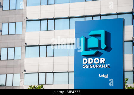BELGRADE, SERBIA - APRIL 29, 2018: DDOR Osiguranje insurance logo on their main office in Serbia. DDOR Novi Sad is a Serbian insurance company, the It Stock Photo