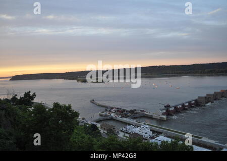 Lock & Dam number 11 in  Dubuque, IA at sunset on the Mississippi River. Stock Photo