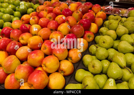Apples and pears for sale at the local market Stock Photo
