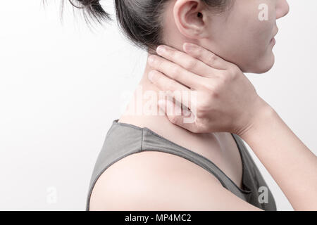 closeup women neck and shoulder pain/injury with white backgrounds, healthcare and medical concept Stock Photo