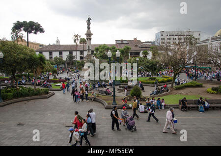 People enjoying the beautiful old colonial style and historical San Francisco plaza, Quito, Ecuador. Stock Photo