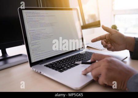 Programmer working Developing programming technologies Web Design Online Technology Stock Photo