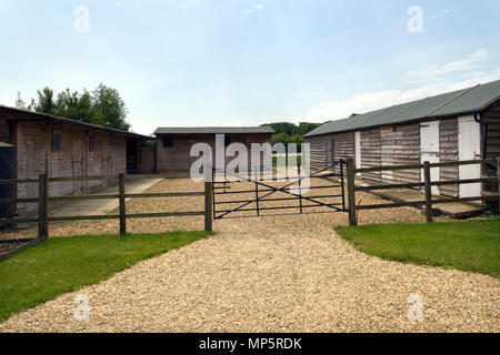 Wooden stable block and stable yard Stock Photo - Alamy