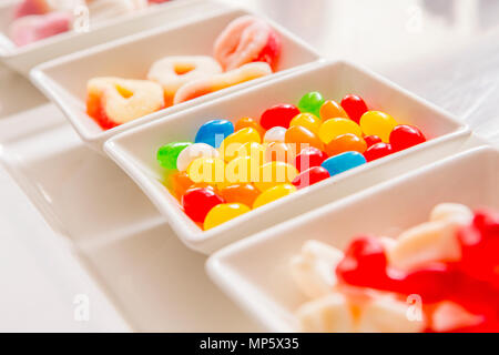 sugar candies in small bowls Stock Photo