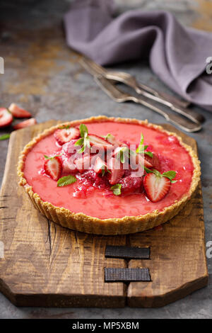 Yogurt tart with rhubarb strawberry compote Stock Photo