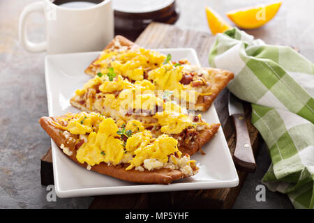 Breakfast pizza, flatbread with scrambled eggs Stock Photo