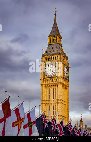 Big Ben towers over flags of the British Commonwealth, London, England, UK Stock Photo