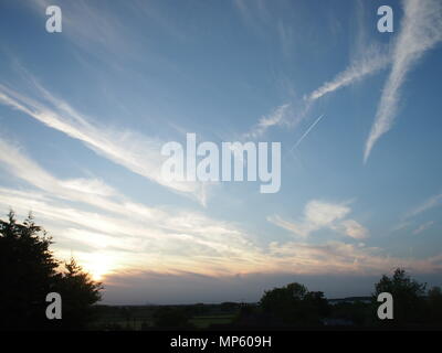 Striking cloud formations in blue evening sky, UK Stock Photo