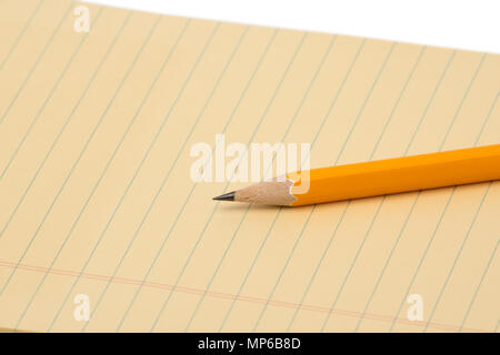 notebook and pencil isolated on white background Stock Photo