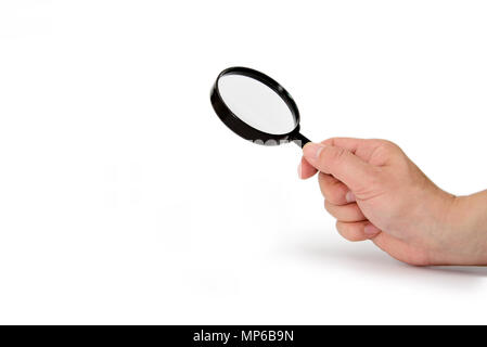 Hand holding magnifying glass isolated on white background Stock Photo