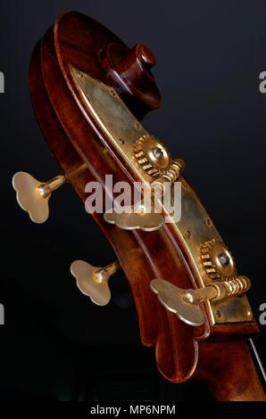 scroll and peg box from a double bass Stock Photo