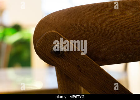 Retro wooden chair with metallic pin detail Stock Photo