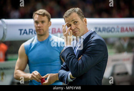 19 May 2018, Germany, Berlin, Soccer, DFB Finals at Olympiastadion, Bayern Munich vs Eintracht Frankfurt: Bayern Munich's goalkeeper Manuel Neuer (L) and team manager Oliver Bierhoff. -NO WIRE SERVICE- Photo: Thomas Eisenhuth/dpa-Zentralbild/ZB Stock Photo