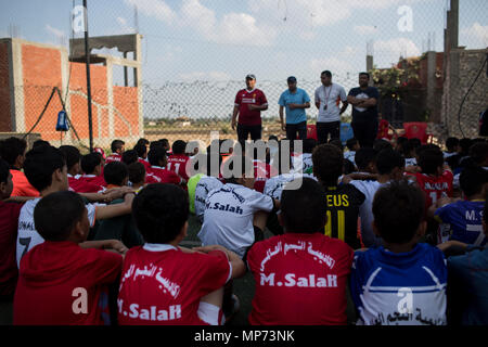 Gharbia, Egypt. 13th May, 2018. A picture made available on 21 May shows an  Egyptian boy, wearing the jersey of Liverpool's Mohamed Salah, practising  football at a field, at the Egyptian star's