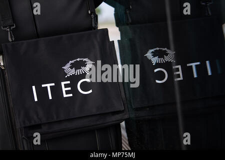 Stuttgart, Germany. 15th May, 2018. 15 May 2018, Germany, Stuttgart: A bag with the ITEC logo hanging from a suitcase during the ITEC fair for military and weapons technology. Credit: Sebastian Gollnow/dpa/Alamy Live News Stock Photo