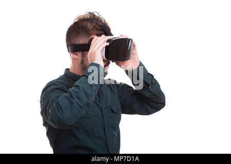 Young man wears a VR virtual reality headset Stock Photo