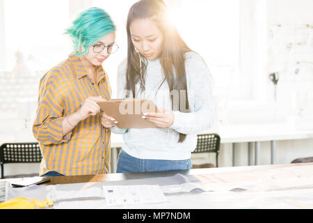 Creative Fashion Designers Collaborating Stock Photo