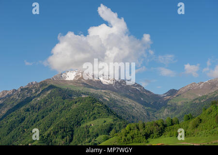 cloud covering the top of the mountain Stock Photo