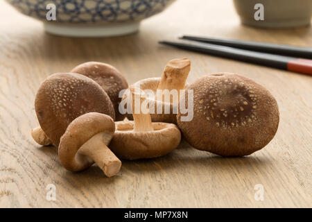 Heap of fresh raw shiitake mushrooms Stock Photo