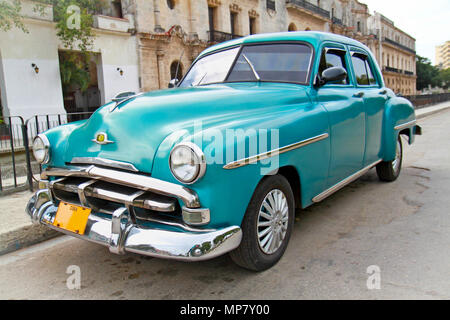 HAVANA-FEBRUARY 1:Classic blue Plymouth on February 1, 2010,Havana.Under current law that the government plans to change before 2012,Cubans can only b Stock Photo