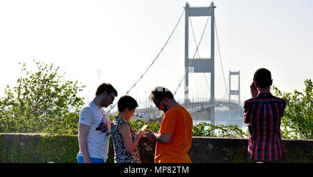 Spectators viewing the old 1966 toll road bridge across the Rivers Severn and Wye between England and Wales carrying the M48 motorway Stock Photo