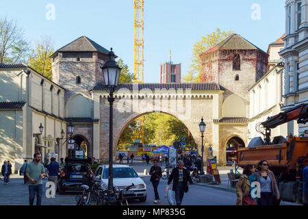 Munich, Germany - October 20, 2017:  Sendling Gate or Sendlinger Tor, remainings of city wall, and retail stores in front of it Stock Photo