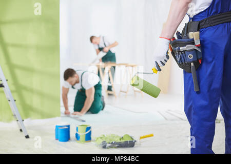 Professional interior renovation crew at work in house Stock Photo