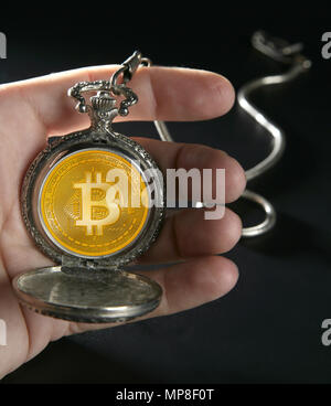 Bitcoin BTC time concept antique vintage pocket watch Stock Photo
