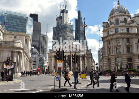 New buildings, The Pinnacle in Bishopsgate and The Leadenhall Building on Leadenhall Street tower over the Royal Exchange at the junction of  Lombard  Stock Photo