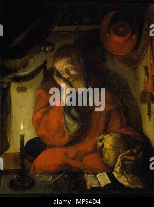 Saint Jerome. Saint Jerome in his study by candlelight. The scholar is in deep thought, staring at a scull in his left hand. On the wall behind him hang his cardinal's hat, a rosary and, to the left, a mirror. Above him a shelve with an hourglass on it. On the table in front of him are an opened book and an inkstand. Circa 1520-1530.   808 Aertgen van Leyden 003 Stock Photo