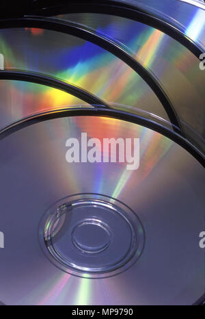 1988 HISTORICAL POLARISED COLORS ON PILE OF FANNED CD ROM COMPACT DISCS Stock Photo