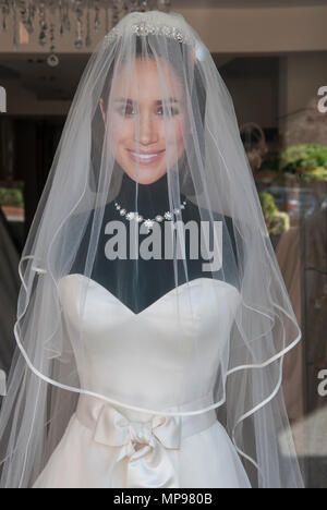 Wedding dress shop using cut out card face of Meghan Markle the Duchess of Sussex May 2018 Windsor England HOMER SYKES Stock Photo