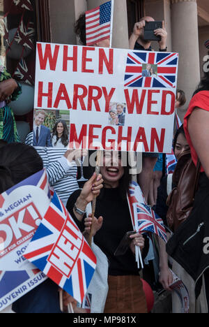 Duke and Duchess of Sussex Royal Wedding Prince Harry Meghan Markle 19 May 2018 excited women girls tourists people in crowd with  “Harry Wed Meghan” banner   Windsor watching procession  HOMER SYKES Stock Photo