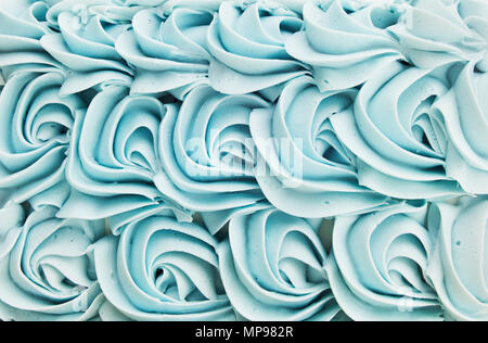 Blue cake icing swirl decoration background pattern. Stock Photo