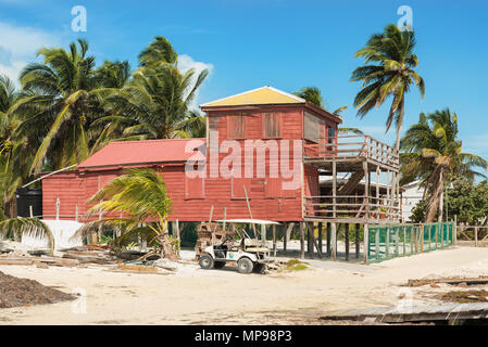 Caye Caulker, Belize - December 20, 2016: View at the colorful wooden house in Caye Caulker. It is a small island near Ambergris Caye, Belize. Stock Photo