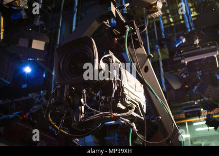 TV camera on crane on concert. TV camera Stock Photo