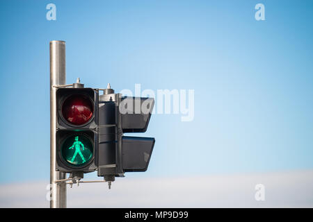 Green light signal for pedestrians to pass intersection in Glenelg, South Australia