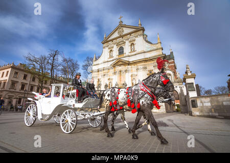 Horse carriages in the old town of Krakow, Poland Stock Photo