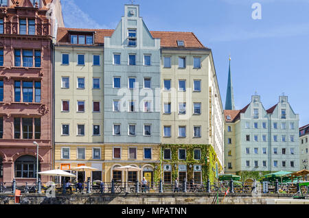 Berlin, Germany - April 22, 2018:  Nikolaiviertel  (Nicholas' Quarter) of Alt-Berlin as seen from the Spree with reconstructed historic houses and its