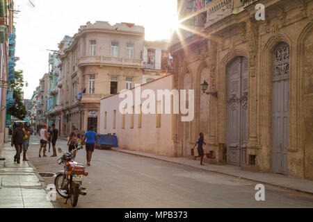 Local cuban children playing soccer and basketball in the streets of Old Havana Cuba Stock Photo