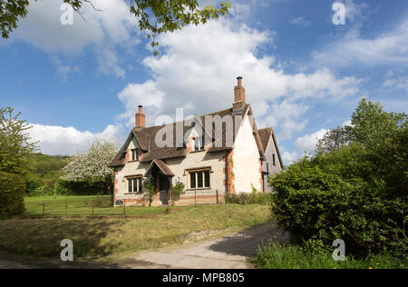 Attractive detached house built from chalk stone in village of Compton Bassett, Wiltshire, England, UK Stock Photo
