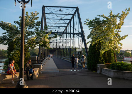 USA Pennsylvania PA Harrisburg Walnut Street  Pedestrian Bridge crossing the Susquehanna River to City Island Park  old car bridge Stock Photo