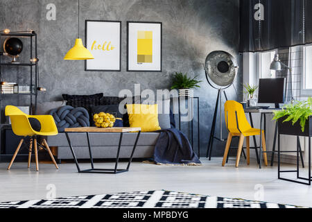 Modern photography studio interior with retro lamp and desk workspace Stock Photo