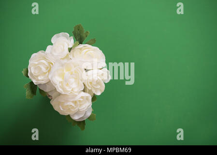 Reusable artificial flowers made from cloth and plastic. Stock Photo