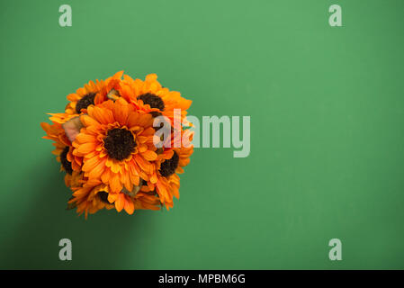 Reusable artificial flowers made from cloth and plastic. Stock Photo