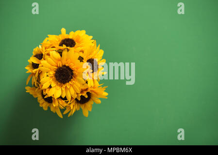 Reusable artificial flowers made from cloth and plastic. Stock Photo