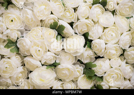Reusable artificial flowers made from cloth and plastic. Stock Photo
