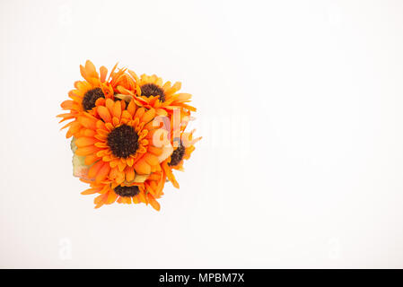 Reusable artificial flowers made from cloth and plastic. Stock Photo