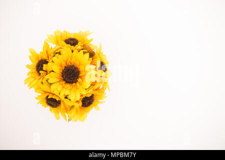 Reusable artificial flowers made from cloth and plastic. Stock Photo